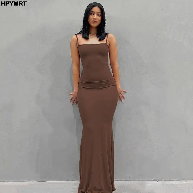 Elegant floor-length dress with a sleek, body-hugging fit — perfect for evening wear and special occasions.