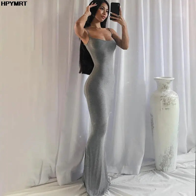 Elegant floor-length dress with a sleek, body-hugging fit — perfect for evening wear and special occasions.