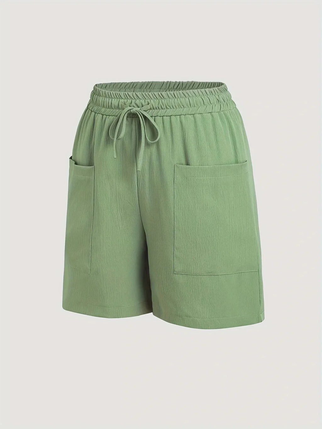 A 2-piece set of solid color casual drawstring shorts with pocket beach pants for women in 2026
