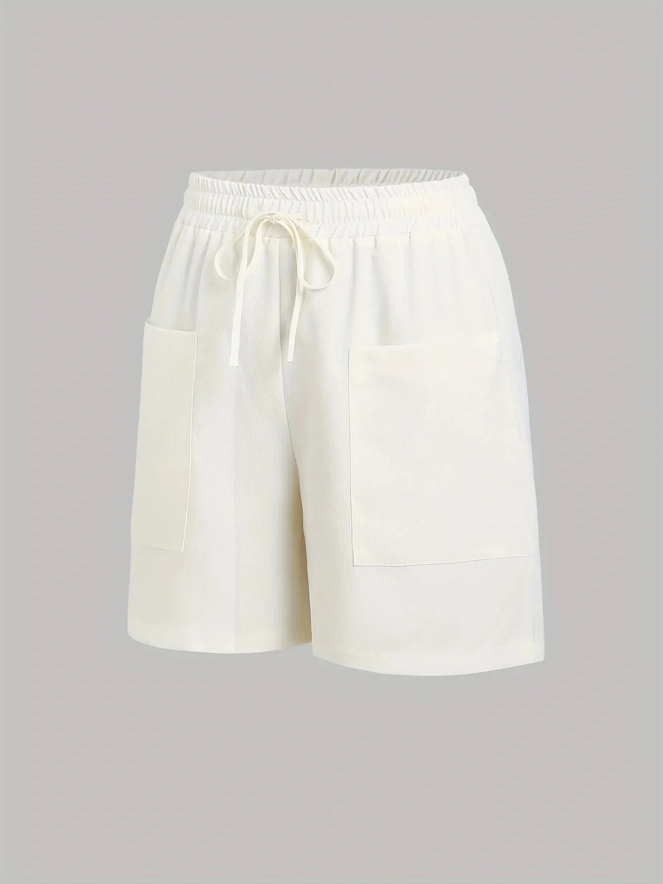 A 2-piece set of solid color casual drawstring shorts with pocket beach pants for women in 2026