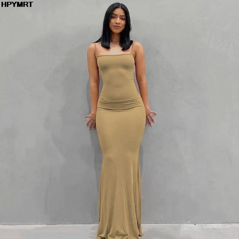 Elegant floor-length dress with a sleek, body-hugging fit — perfect for evening wear and special occasions.