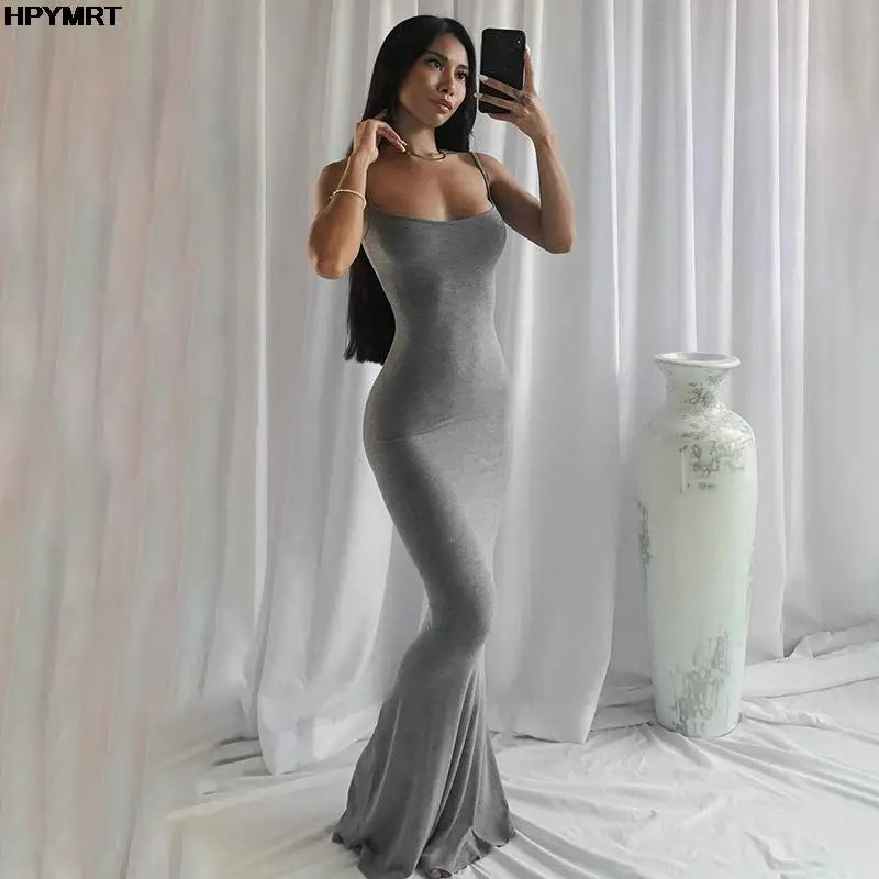 Elegant floor-length dress with a sleek, body-hugging fit — perfect for evening wear and special occasions.